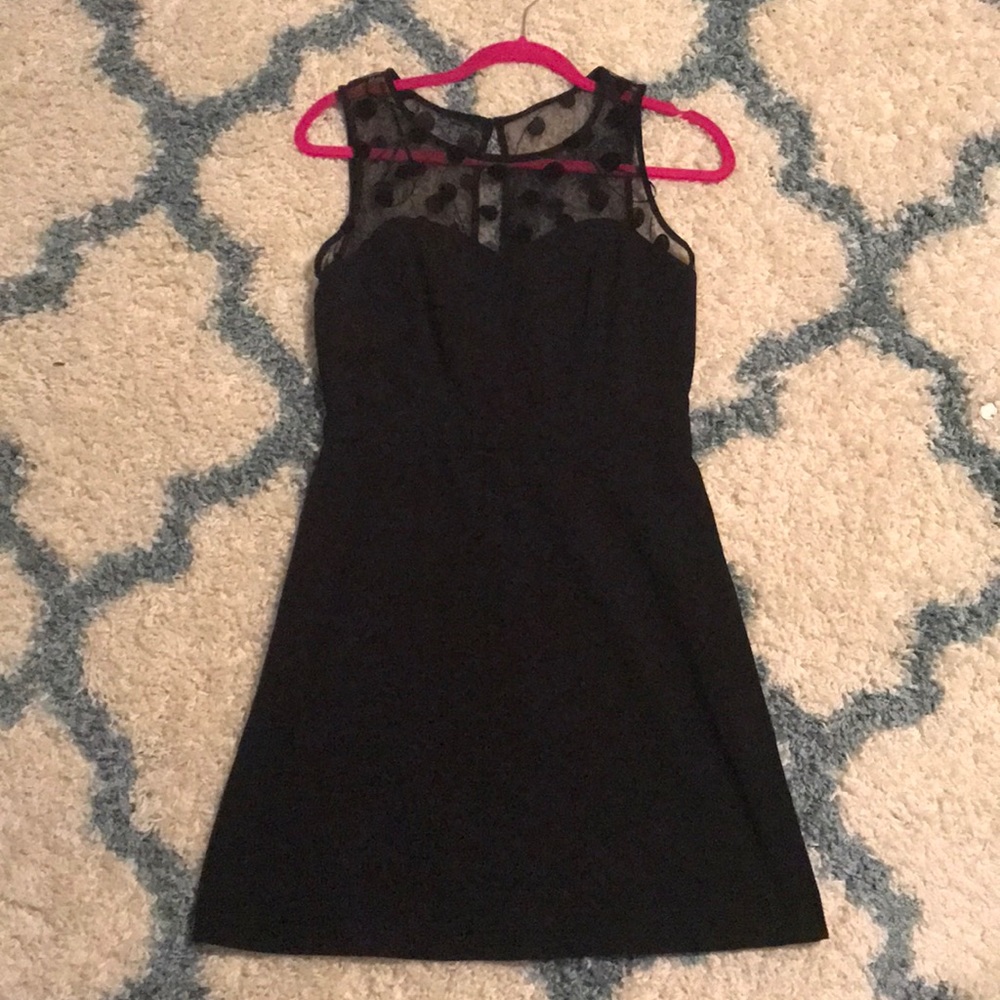 Black party dress with netted sweetheart neckline